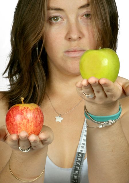 girl with apples on her hands
