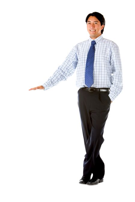 Businessman standing next to an imaginary object isolated over white