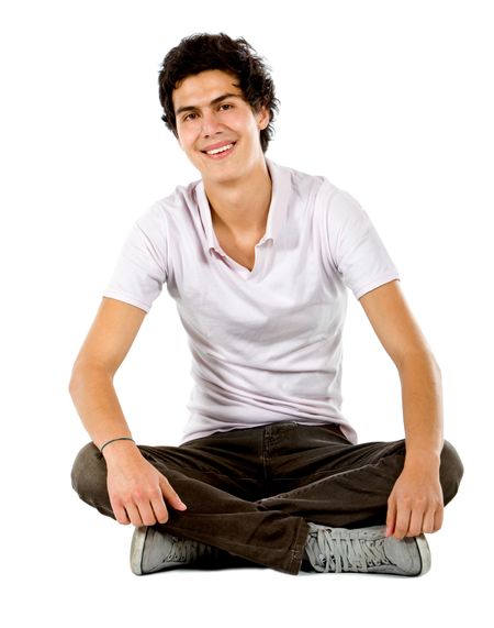 Man sitting on the floor isolated over a white background