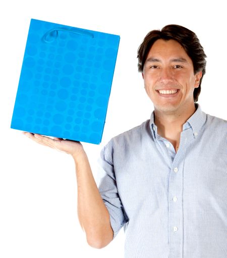 Man holding a shopping bag next to his face -  isolated over white