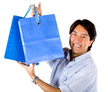 Happy man with shopping bags isolated over a white background