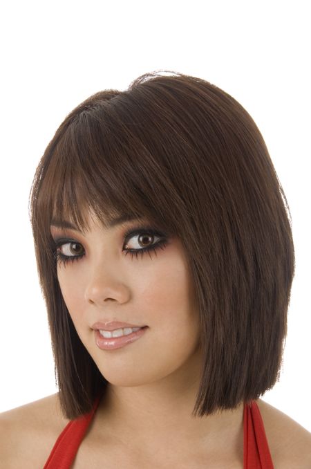 Pretty young Asian-American woman, head shot with copy space above