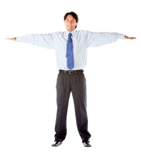 Friendly business man smiling with arms up isolated over a white background