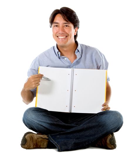 Male student pointing something in a notebook - isolated over white