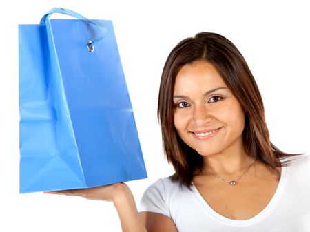 Woman with a shopping bag isolated over a white background