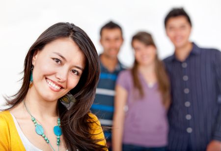 casual-girl-group-isolated-white-background-47014045 Casual girl with a group behind isolated over a white background