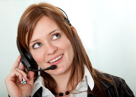 Beautiful woman wearing a headset - Business concepts