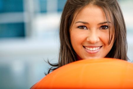 fitness woman smiling and looking happy at the gym