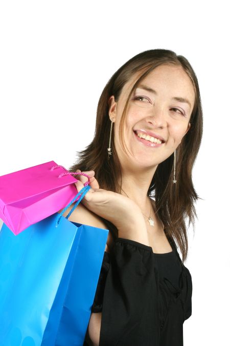 girl with shopping bags over her shoulder