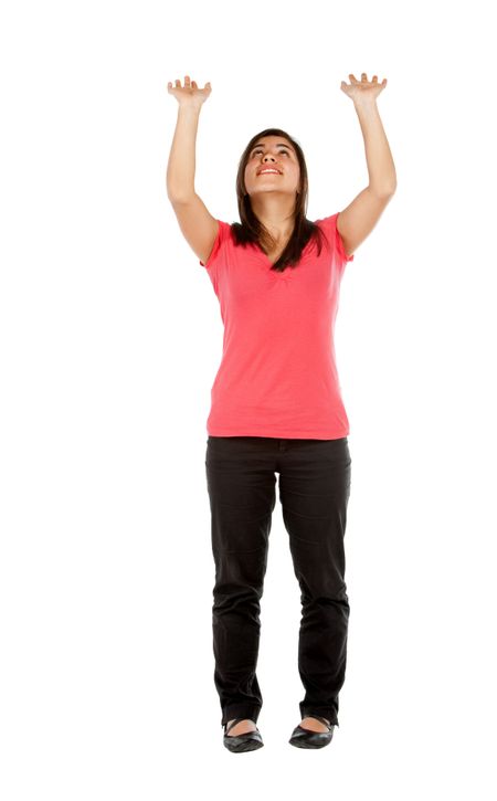Woman lifting an imaginary object isolated over a white background