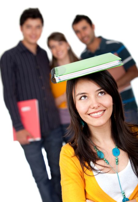 Female student with a notebook on her head and a group behind - isolated