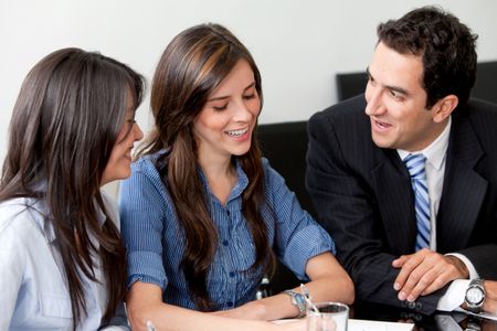 Group of business people talking at the office