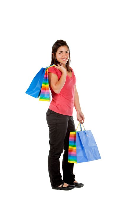 Fullbody shopping woman isolated over a white background