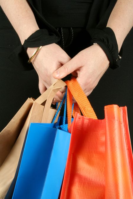 business woman holding shoping bags