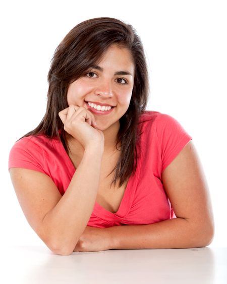 Casual woman smiling isolated over a wite background