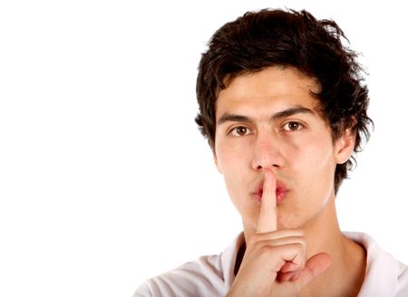 Man making a "Be quiet" sign isolated over a white background