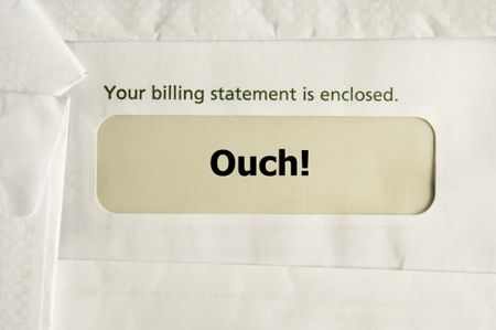 Envelope with billing statement and "Ouch!" in cellophane window