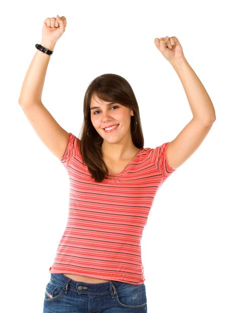 successful girl looking happy with her arms up isolated over a white background