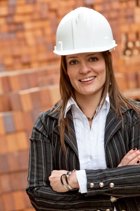 female engineer smiling in a construction site
