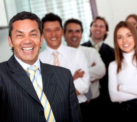 group of business people smiling in an office
