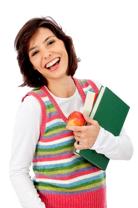 Woman with books and an apple isolated over a white background