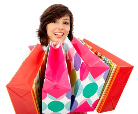 Shopping woman portrait with bags isolated over white