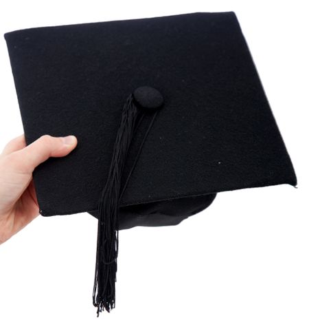 Black mortarboard isolated over a white background