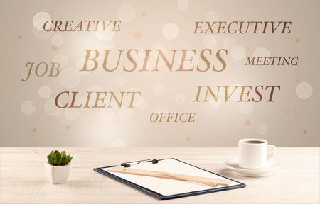 Business job office concept with close up wooden desk and materials, papers and electronic equipement