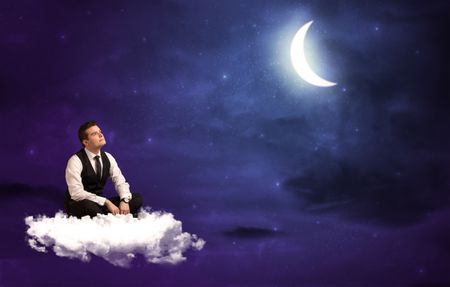 Caucasian businessman sitting on a cloud, wondering