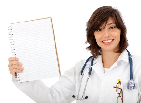 friendly female doctor holding a blank sheet of paper isolated over white