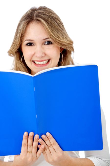 Beautiful female student with a notebook isolated over a white background