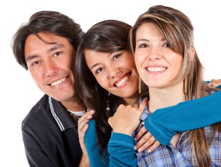 Portrait of a brother and his two sisters isolated over a white background