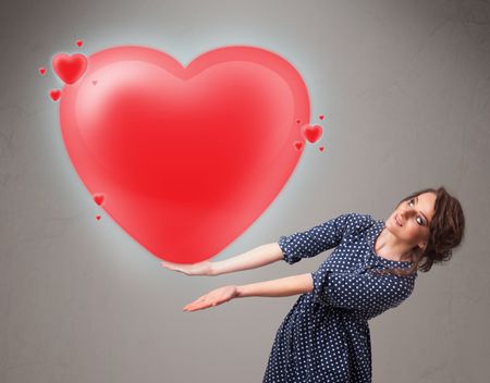 Beautiful young lady holding lovely 3d red heart