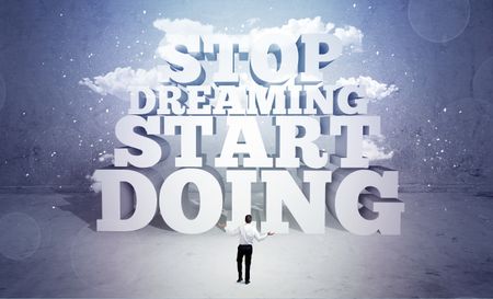 A lazy sales person standing in emty space with huge block letters illustration saying stop dreaming start doing and clouds concept