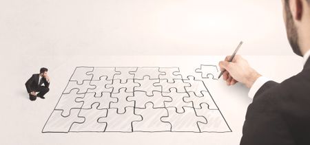 Business man looking at hand drawing solution, puzzle solution concept