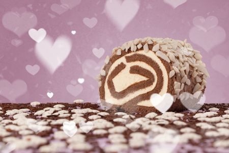 Delicious pretty party cakes with heart shape symbols on colorful background