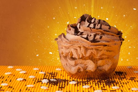 Sparkling tasteful home made sugar cake with coloful background