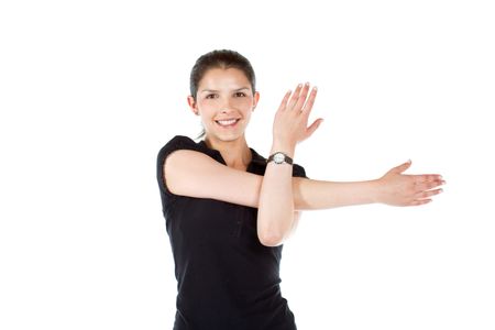 Woman doing stretching exercises for her arm and back isolated over a white background