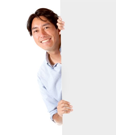 casual man displaying a banner ad isolated over a white background