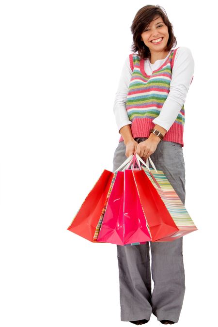 happy woman smiling with shopping isolated over a white background