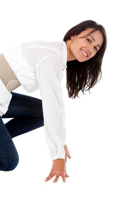 casual woman ready to race isolated over a white background
