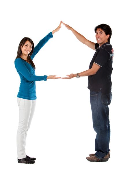 Beautiful couple portrait smiling and making a triangle with their arms isolated over white