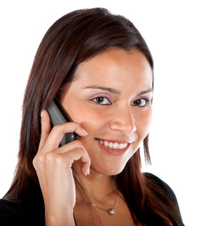 casual woman talking on the phone isolated over a white background