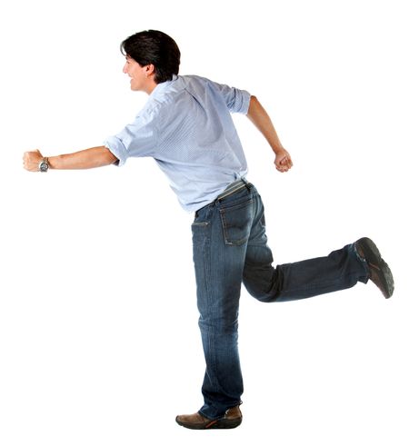 casual man smiling and running isolated over a white background