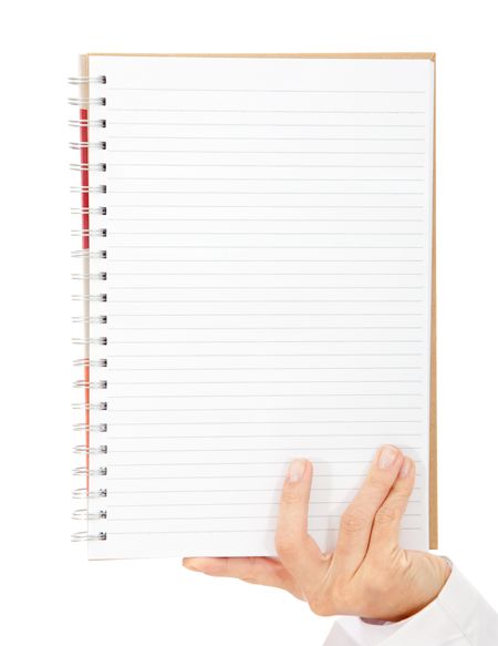 Hand holding blank spiral notebook isolated over a white background