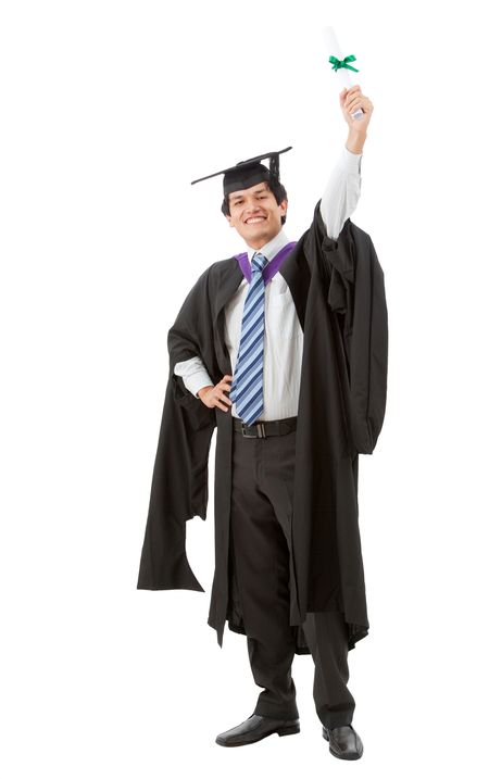 male graduation portrait smiling and showing his diploma