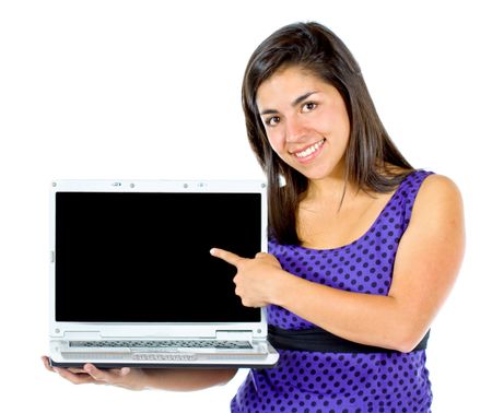 Casual girl displaying a laptop computer isolated over a white background