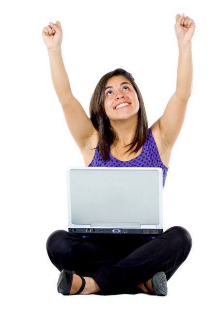 casual success girl on a laptop computer isolated over a white background