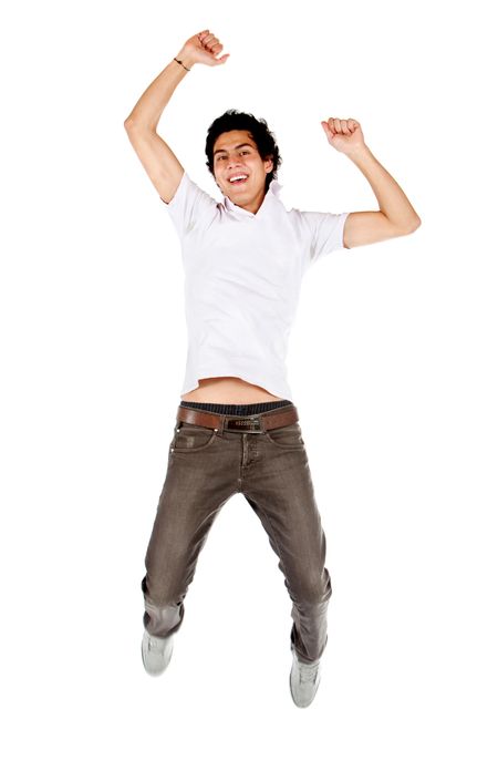 casual man smiling and jumping full of joy isolated over a white background