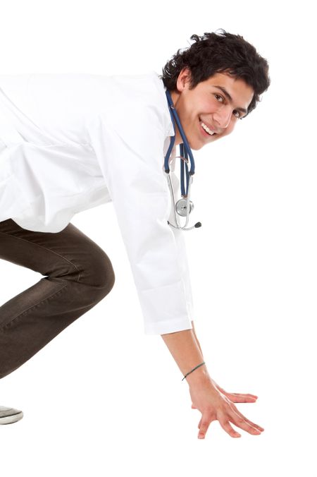friendly male doctor ready to race isolated over a white background